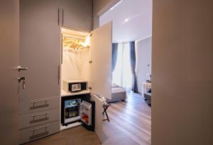 a room with a room with a bed and a fireplace at Il Genovino in Genoa