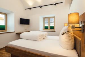Łóżko lub łóżka w pokoju w obiekcie Nowders Apartments