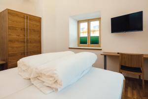Łóżko lub łóżka w pokoju w obiekcie Nowders Apartments