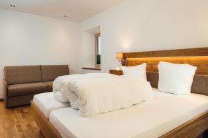 Łóżko lub łóżka w pokoju w obiekcie Nowders Apartments