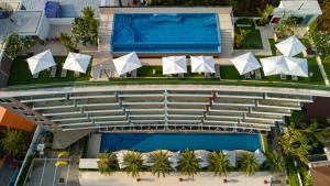 an aerial view of a resort with a swimming pool at Babylon Sky Garden in Rawai Beach