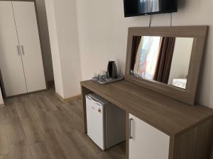 Kuchyň nebo kuchyňský kout v ubytování M-Rooms