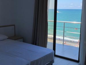 Letto o letti in una camera di M-Rooms