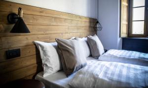 Postel nebo postele na pokoji v ubytování Casa Pasini-Foresteria