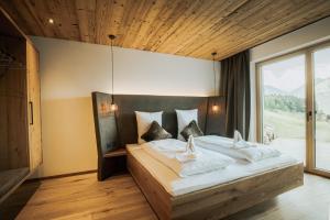 Letto o letti in una camera di Rufana Alpin