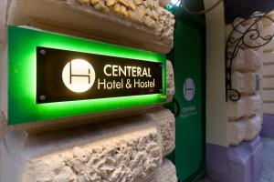 a sign that reads central hotel and hotel at Centeral Hotel Moscow in Moscow
