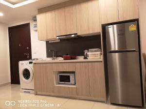 A cozinha ou kitchenette de 2BDR in Water Resort close to WalkingStreet