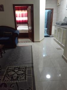 O bucătărie sau chicinetă la Petra Visitors Hotel