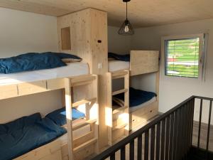 Postel nebo postele na pokoji v ubytování mytinyhome