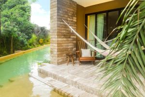 Bazén v ubytování Hotel Xcaret Mexico All Parks All Fun Inclusive nebo v jeho okolí