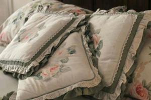 a bed with two pillows on top of it at B&B del Giglio in Cefalù