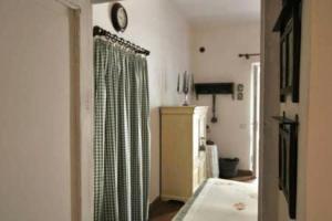 a living room with a shower curtain in a room at B&B del Giglio in Cefalù