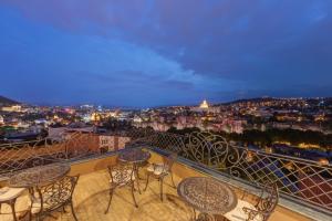 Nespecifikovaný výhled na destinaci Tbilisi nebo výhled na město při pohledu z hotelu