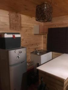 Una cocina o cocineta en Cabañas entre montañas 27 fotos más