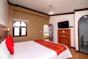 Cama ou camas em um quarto em Royal Inka II