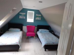 מיטה או מיטות בחדר ב-Ballyallaght House