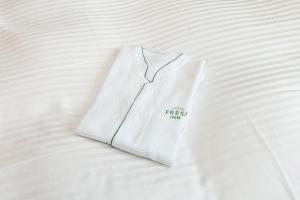 Кровать или кровати в номере Sotetsu Fresa Inn Hamamatsucho-Daimon