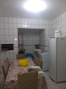Kuchyň nebo kuchyňský kout v ubytování Casa temporada Garopaba + 2 fotografie
