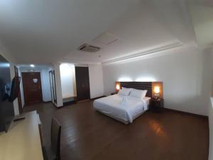 Katil atau katil-katil dalam bilik di Sara Hotel