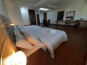Katil atau katil-katil dalam bilik di Sara Hotel