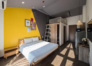 Postel nebo postele na pokoji v ubytování Wings House