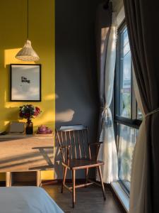 Postel nebo postele na pokoji v ubytování Wings House