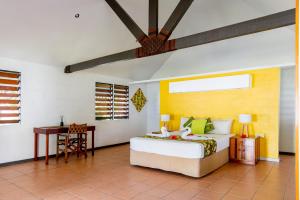 Giường trong phòng chung tại Belo Vula Island Resort Limited