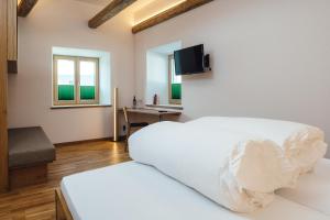 Łóżko lub łóżka w pokoju w obiekcie Nowders Apartments