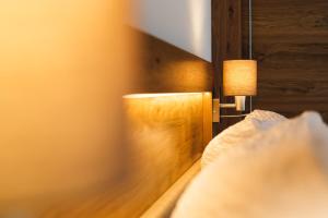Łóżko lub łóżka w pokoju w obiekcie Nowders Apartments