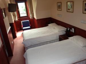 Postel nebo postele na pokoji v ubytování Beeches Aberdeen