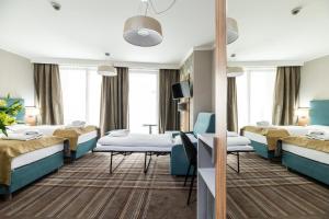 Posteľ alebo postele v izbe v ubytovaní Hotel Perfect