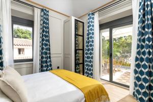 Postel nebo postele na pokoji v ubytování Apartamentos Pedregalejo