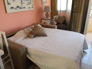 Postel nebo postele na pokoji v ubytování Apartamento Bella Lucia