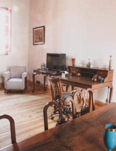 a living room with a desk and a chair at NICOSIA EAGLE EYE in North Nicosia