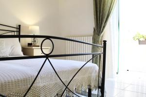 Postel nebo postele na pokoji v ubytování Casa Nina