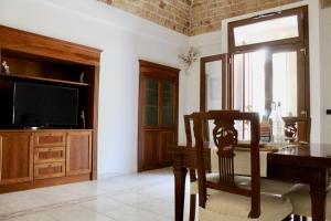 TV a/nebo společenská místnost v ubytování Casa Nina