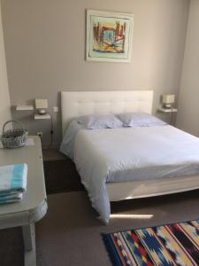 Cama o camas de una habitación en Chambre d'Hôtes Le Moulin