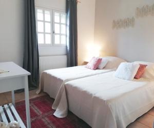 Postel nebo postele na pokoji v ubytování Domaine des Goudis