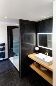 a bathroom with a sink and a mirror at CHATEAU CROIX DE LABRIE in Saint-Émilion