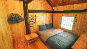 Postel nebo postele na pokoji v ubytování Joy House Sapa