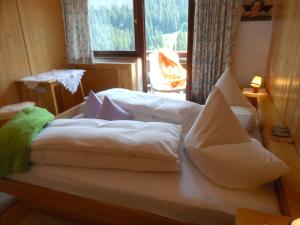 Cama o camas de una habitación en Haus Brunneck