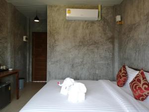 Кровать или кровати в номере JR Place