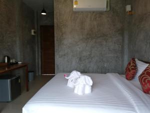 Кровать или кровати в номере JR Place