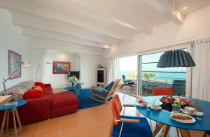 Χώρος καθιστικού στο Piccolo Grand Hotel