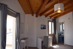 Kuchyň nebo kuchyňský kout v ubytování Corallo Rooms