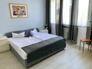 Postel nebo postele na pokoji v ubytování Art Hotel Köln