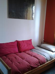 A bed or beds in a room at Le Magnolie B&B