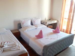 Voodi või voodid majutusasutuse Guesthouse DONA toas