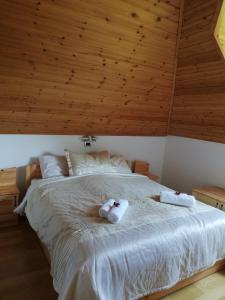 Cama o camas de una habitación en Casa Ninfea Panzió