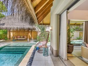 an image of a villa with a swimming pool at JOALI Maldives in Raa Atoll